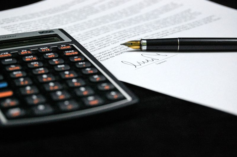 Stock photo of calcumator and letter