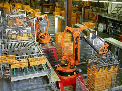 Stock photo of robots stacking pallets in a factory from Wikipedia