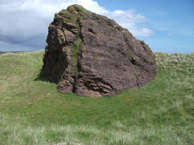Image of a large rock outcropping on a hillside